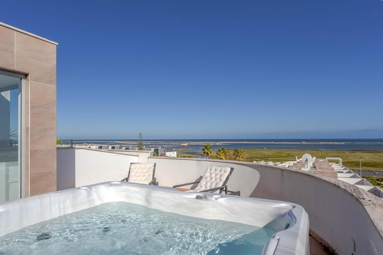 Penthouse Quilha Apartment Fuzeta Bagian luar foto