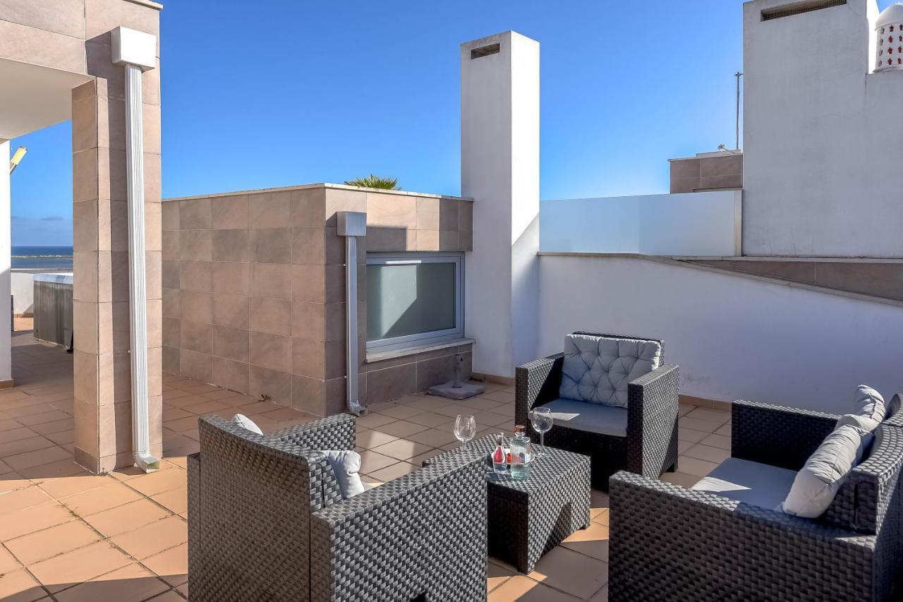 Penthouse Quilha Apartment Fuzeta Bagian luar foto