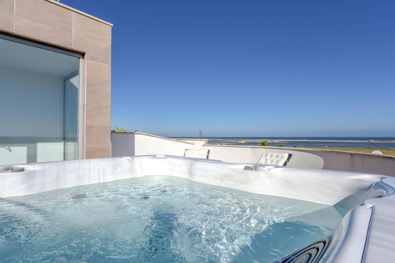 Penthouse Quilha Apartment Fuzeta Bagian luar foto